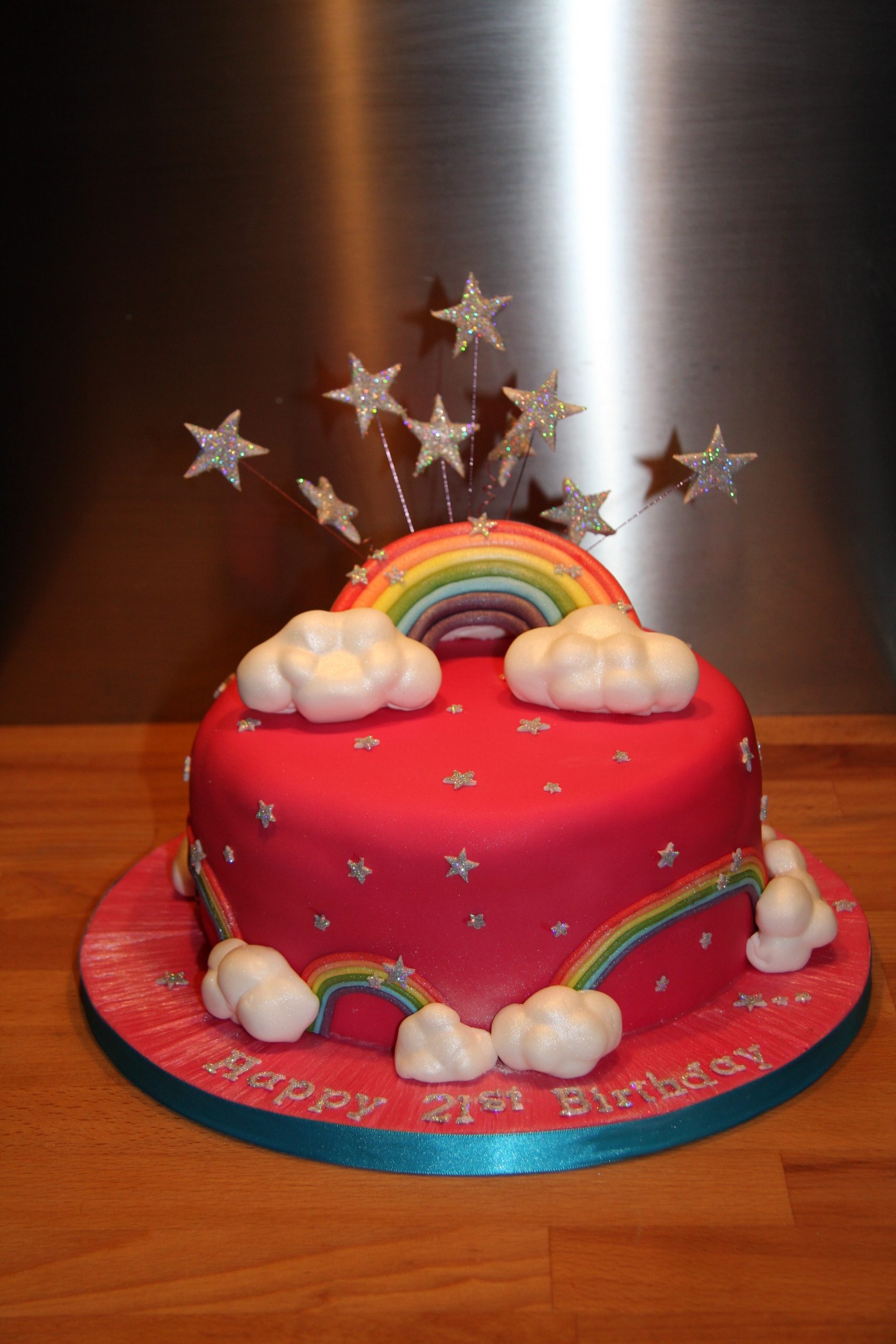 Pink sparkly rainbow cake